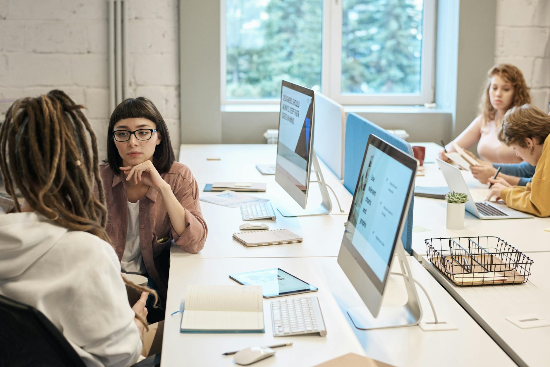 people in front of the computers